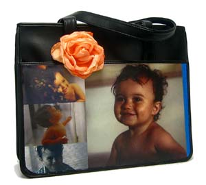A 'Your Sister's Moustache' custom made bag with a baby picture on it