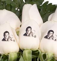 Picture of white roses with image of couple embossed on petals